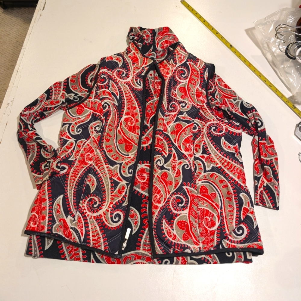 Paisley combo turtle neck and reversible vest.
